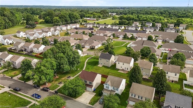 1310 Silver Dr, Mebane, NC 27302 - aerial perspective of suburban area with a forest
