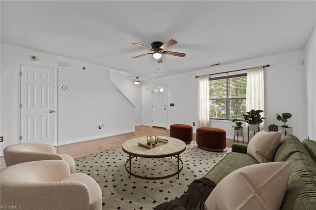 1310 Silver Dr, Mebane, NC 27302 - living area featuring ceiling fan, wood finished floors, and baseboards