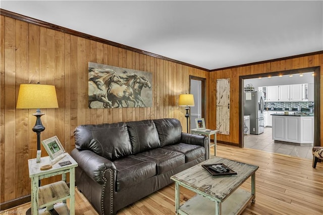 408 Camelot Dr, Salisbury, NC 28144 - living area featuring ornamental molding, wooden walls, and light wood-style floors