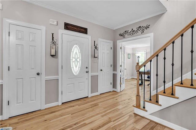 408 Camelot Dr, Salisbury, NC 28144 - entryway featuring wood finished floors, ornamental molding, and stairs