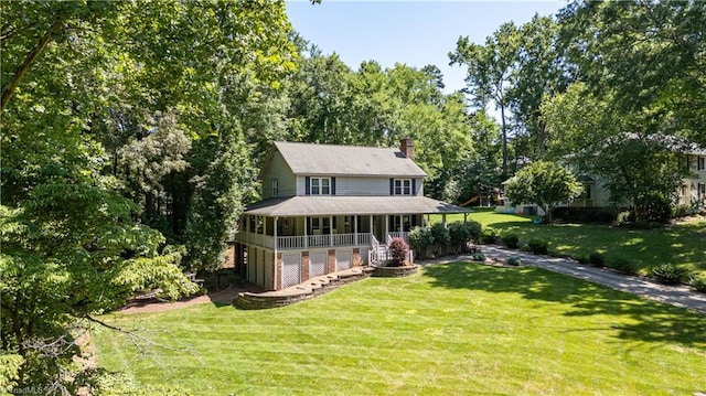 408 Camelot Dr, Salisbury, NC 28144 - view of front facade with a porch, a chimney, and a front lawn