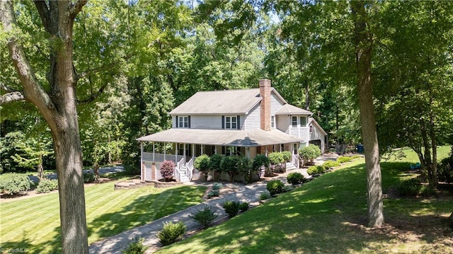 408 Camelot Dr, Salisbury, NC 28144 - country-style home with a porch, a chimney, a front lawn, and stairs