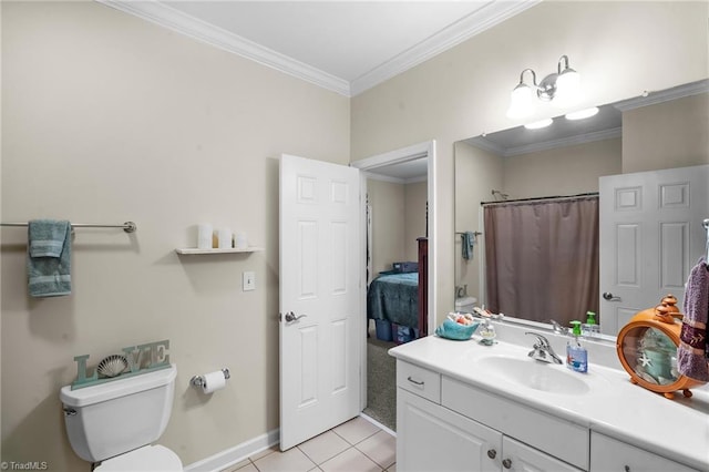 full bath with tile patterned floors, toilet, crown molding, baseboards, and vanity