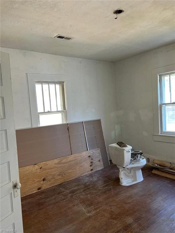 interior space with dark hardwood / wood-style floors