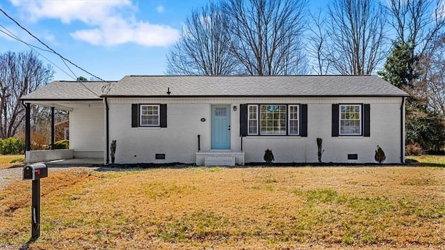 ranch-style house with brick siding, crawl space, and a front yard