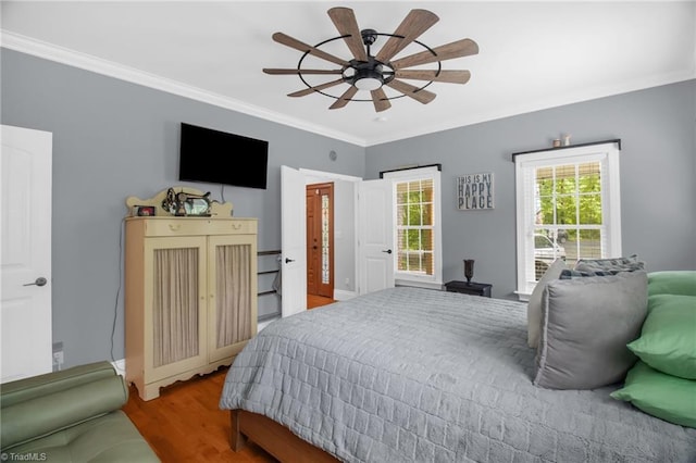 3080 Shiloh Church Rd, Winston-Salem, NC 27105 - bedroom with crown molding, wood finished floors, and a ceiling fan