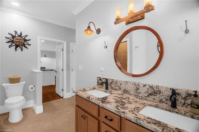 3080 Shiloh Church Rd, Winston-Salem, NC 27105 - full bath featuring crown molding, double vanity, toilet, baseboards, and tile patterned floors