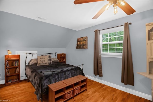 3080 Shiloh Church Rd, Winston-Salem, NC 27105 - bedroom with wood finished floors, baseboards, a ceiling fan, and vaulted ceiling