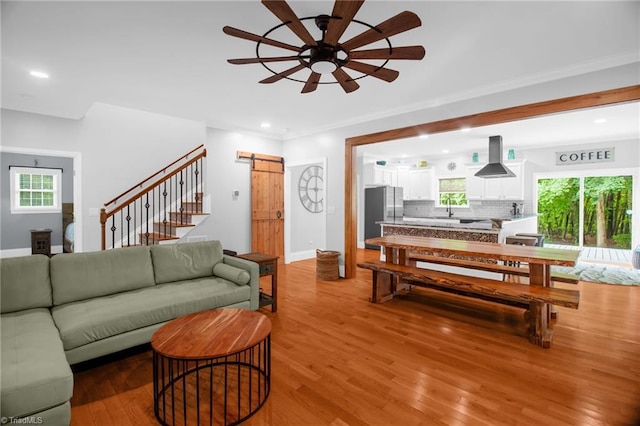 3080 Shiloh Church Rd, Winston-Salem, NC 27105 - living area featuring a ceiling fan, wood finished floors, a barn door, recessed lighting, and baseboards