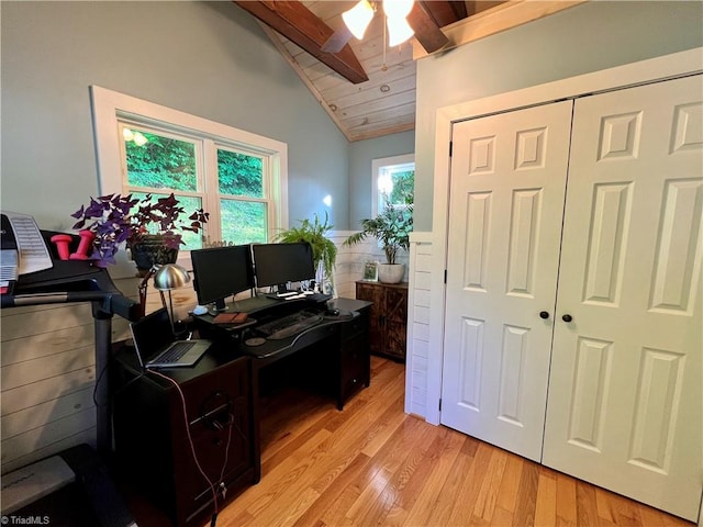 office featuring ceiling fan, vaulted ceiling, and light hardwood / wood-style flooring