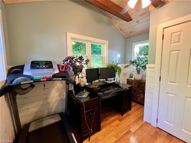 office with ceiling fan, vaulted ceiling, and light hardwood / wood-style flooring