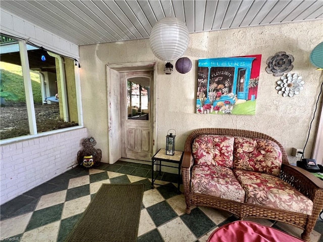 interior space with dark tile flooring