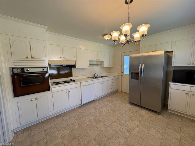 2504 Denise Dr, Greensboro, NC 27407 - kitchen with stainless steel refrigerator with ice dispenser, oven, white dishwasher, electric cooktop, and under cabinet range hood