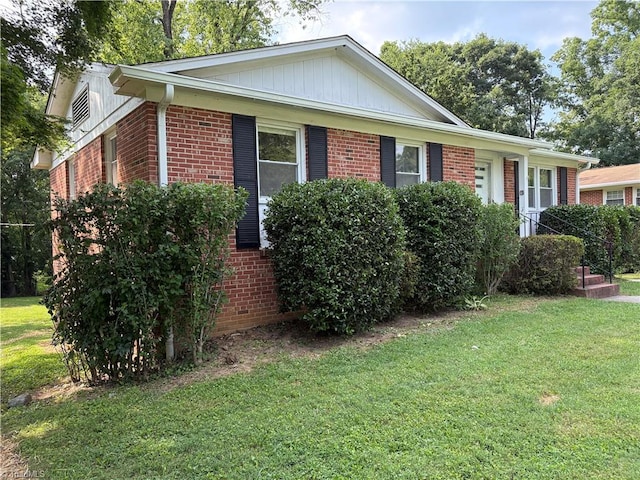 2504 Denise Dr, Greensboro, NC 27407 - view of front of house featuring brick siding and a front lawn