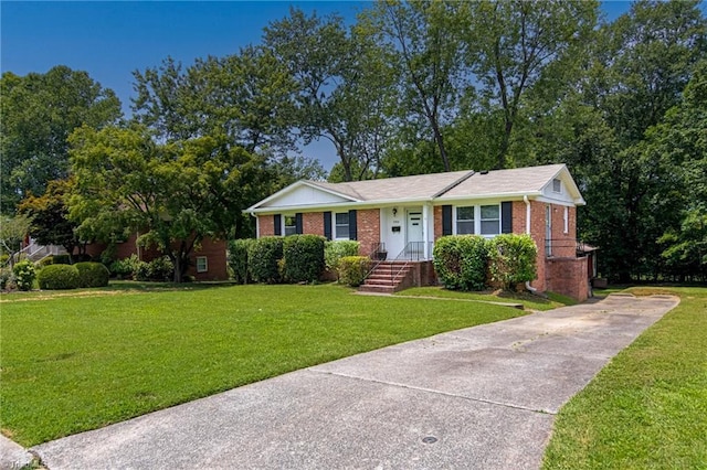 2504 Denise Dr, Greensboro, NC 27407 - single story home with brick siding, concrete driveway, and a front yard