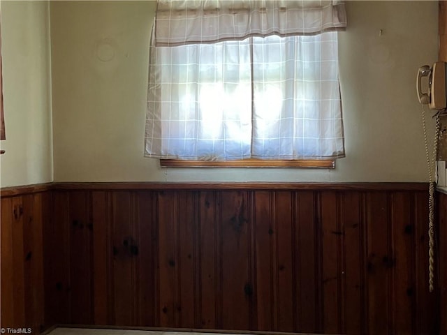 room details featuring wood walls