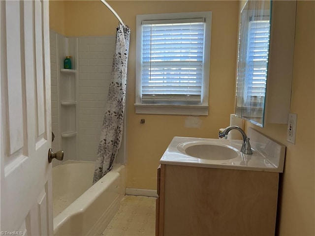 bathroom with shower / bathtub combination with curtain and vanity