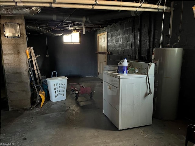 basement featuring electric water heater and washer / clothes dryer