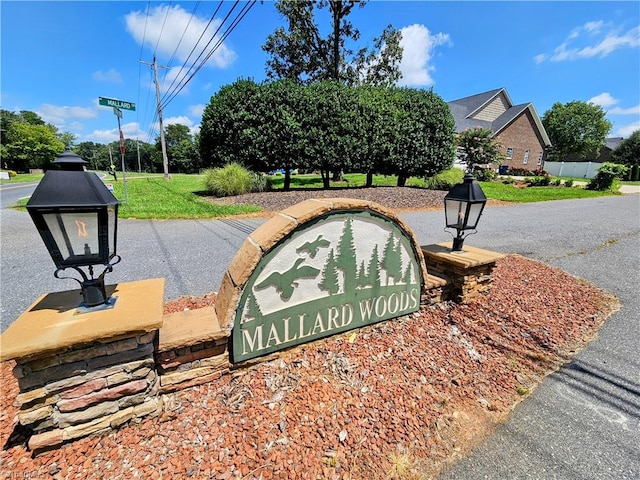 view of community sign