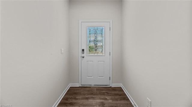 doorway to outside with dark hardwood / wood-style flooring