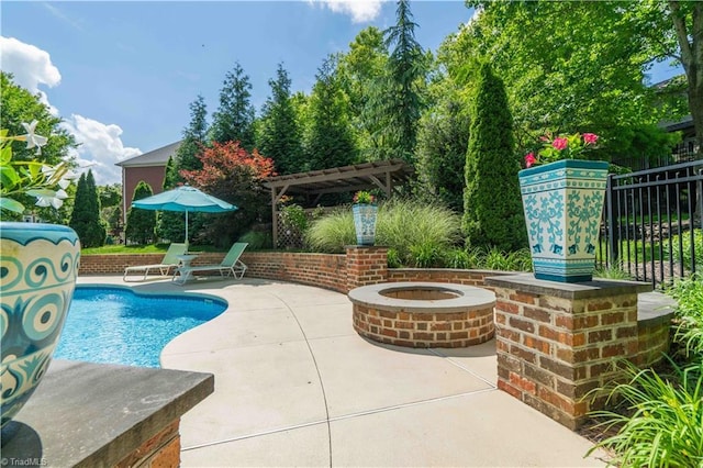 8116 Glengarriff Rd, Clemmons, NC 27012 - swimming pool featuring an outdoor fire pit, fence, a patio, and a pergola