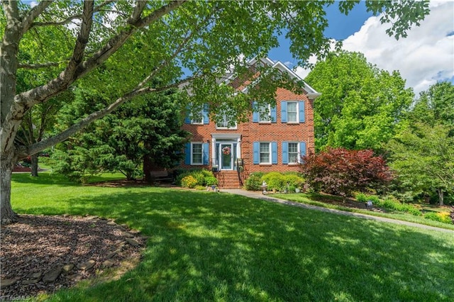 8116 Glengarriff Rd, Clemmons, NC 27012 - view of front of property featuring brick siding and a front lawn