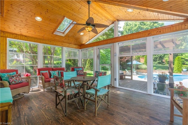 8116 Glengarriff Rd, Clemmons, NC 27012 - sunroom / solarium featuring a skylight, a deck, wood finished floors, wood ceiling, and beamed ceiling