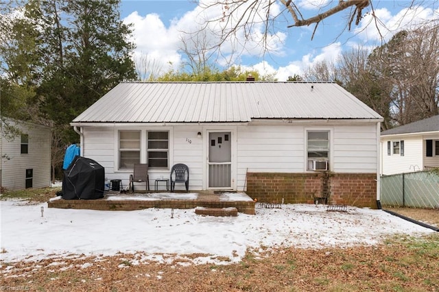 view of snow covered property