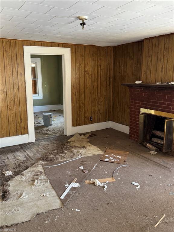 unfurnished living room with a fireplace