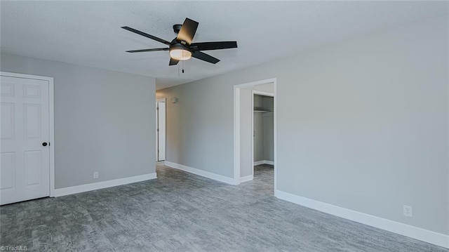 empty room featuring ceiling fan