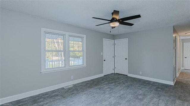 unfurnished room featuring ceiling fan