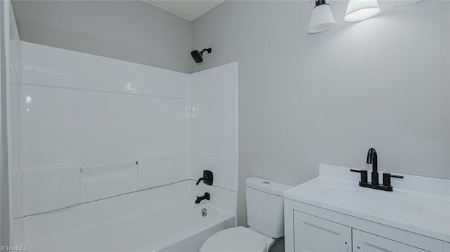 full bathroom featuring toilet, shower / washtub combination, and vanity