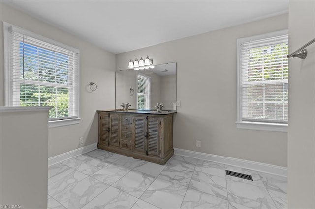 1810 Elm St N, Greensboro, NC 27408 - bathroom with marble look tiles and double vanity