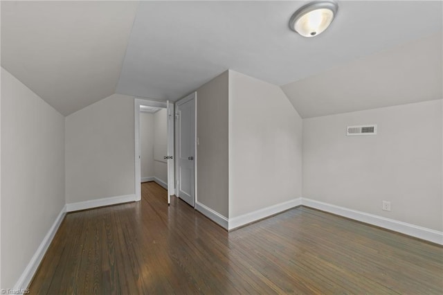 1810 Elm St N, Greensboro, NC 27408 - additional living space with vaulted ceiling and wood finished floors