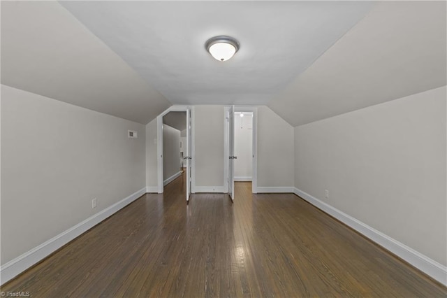 1810 Elm St N, Greensboro, NC 27408 - additional living space featuring dark wood-style flooring and lofted ceiling