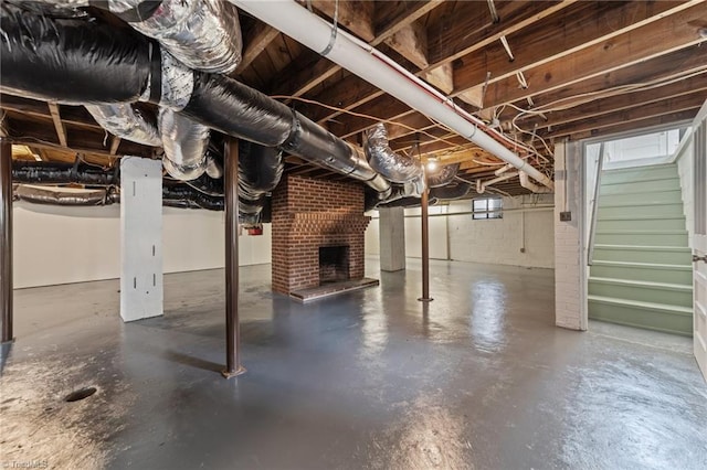 1810 Elm St N, Greensboro, NC 27408 - basement featuring stairway and a brick fireplace