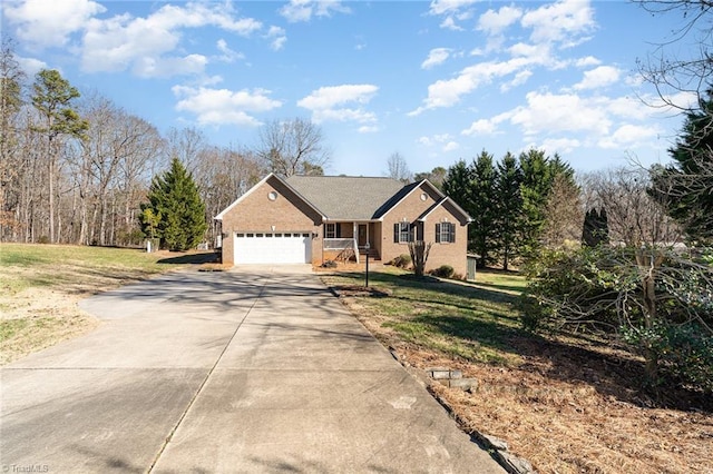 view of front facade with a garage and a front yard