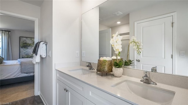 bathroom featuring vanity and wood-type flooring