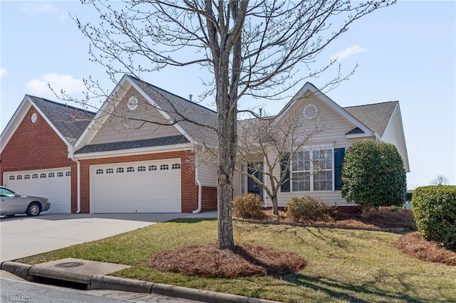 ranch-style house with brick siding, driveway, a front lawn, and a garage