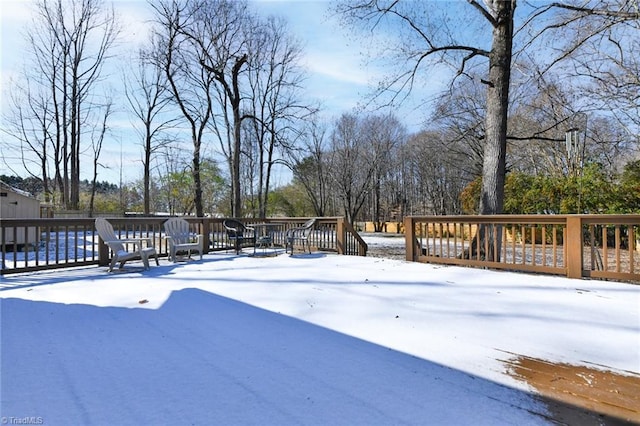 view of snow covered deck