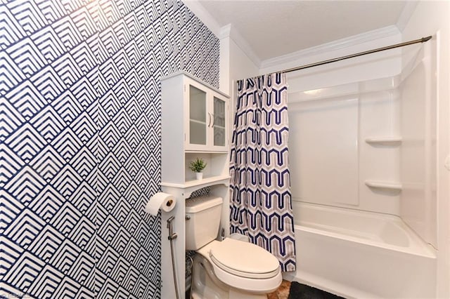 bathroom featuring crown molding, shower / bath combo with shower curtain, and toilet