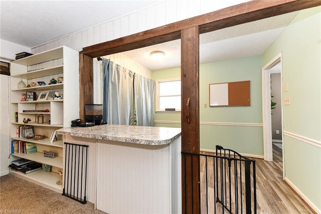 kitchen featuring a textured ceiling