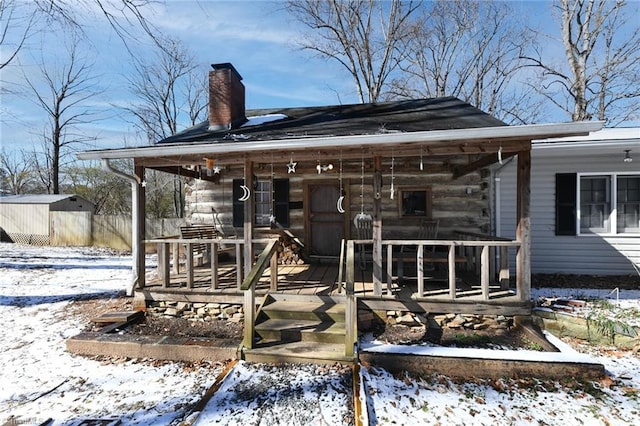 exterior space featuring a shed and a porch