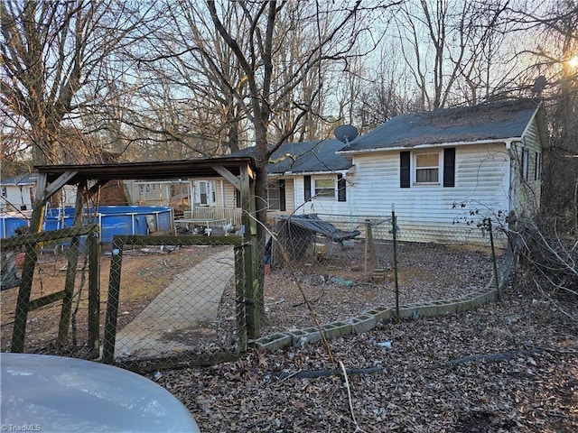 view of front of property featuring fence private yard and a gate