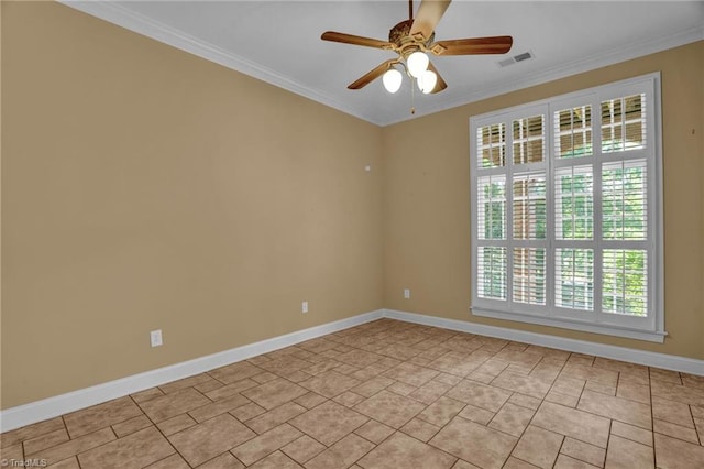 empty room featuring ornamental molding and ceiling fan