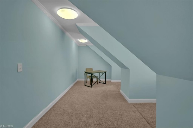 additional living space featuring lofted ceiling and light colored carpet