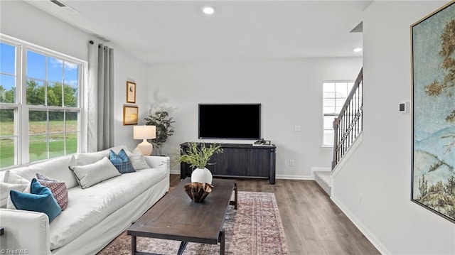 living room with hardwood / wood-style flooring