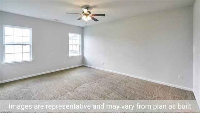 unfurnished room with ceiling fan and carpet floors