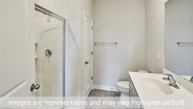 bathroom with toilet, an enclosed shower, and vanity