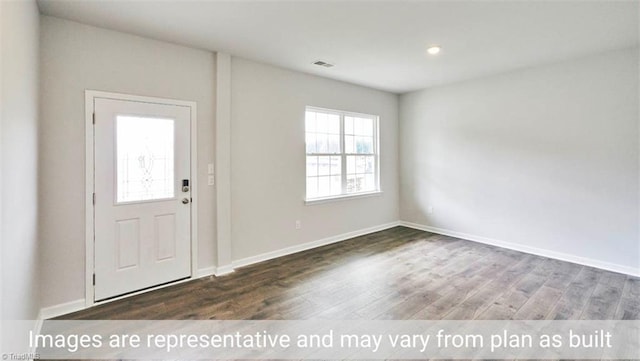 entrance foyer with dark hardwood / wood-style floors